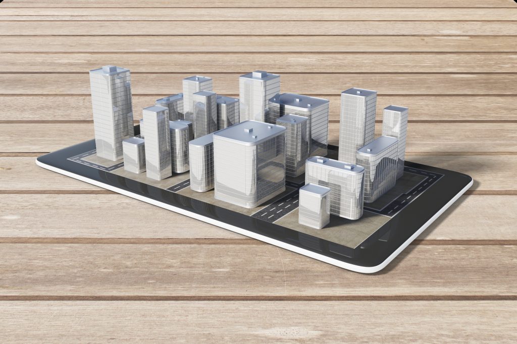 Ein Smartphone liegt auf einem Tisch. Auf dem Smartphone ist eine 3D-Stadt zu sehen